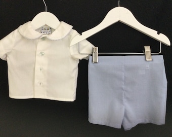 Baby boy’s outfit with white shirt and blue shorts in a 3 month size