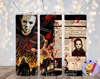 May include: A stainless steel tumbler featuring a graphic of Michael Myers from the Halloween film franchise. The graphic includes blood splatters and the text "Welcome to Haddonfield" and "Can't Kill the Boogeyman".