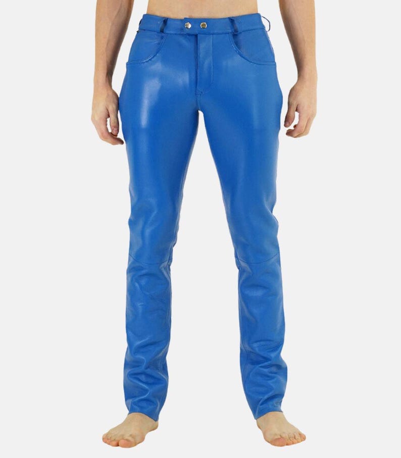 May include: Bright blue leather pants with a classic five-pocket design. The pants have a button and zipper closure and are made of a shiny, smooth material. The pants are a solid color and have a tailored fit.