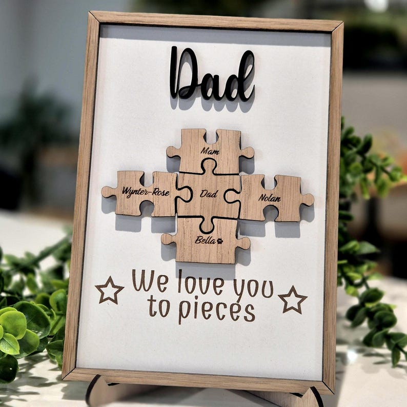 May include: A rustic wooden sign with the text "Welcome to our home" in white lettering. The sign features a distressed finish and a simple, inviting design, perfect for entryway decor.