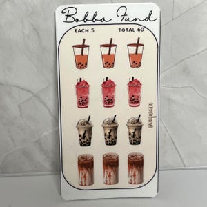 May include: A white sticker with the words "Bobba Fund" and illustrations of boba tea. The sticker features three rows of boba tea cups in different flavors, including brown, red, and brown and white. The sticker has the text "EACH 5" and "TOTAL 60".