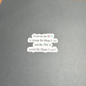 May include: A white sticker with the text "Grant me the HRT to change the things I can and the THC to accept the things I can't."