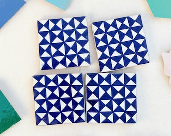 Handcrafted Moroccan Ceramic Tiles: Blue and White Geometric Pottery