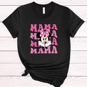May include: Black t-shirt with a pink and white graphic of Minnie Mouse and the text "MAMA" repeated four times.