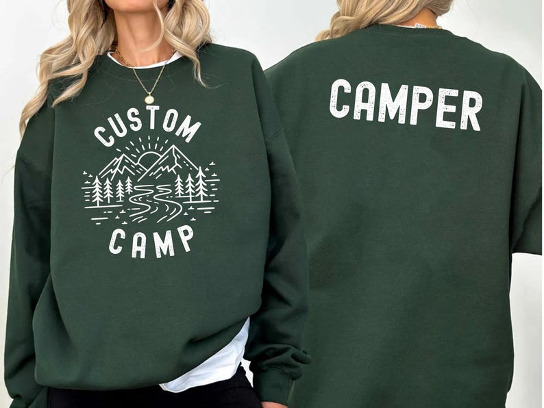 Personalized Camping Shirt With Outdoor Landscape Featuring Mountains And Trees On Front And Camper Text On Back, Custom Family Trip T Shirts Perfect For Nature Lovers And Camping Adventure Wear.