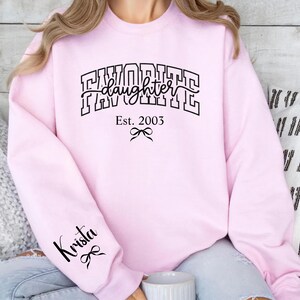 favorite daughter sweatshirt mom of daughters, personalized est year design shirt, custom sleeve name sweatshirt, mom aesthetic clothing black white pink print, emotional mom gift idea