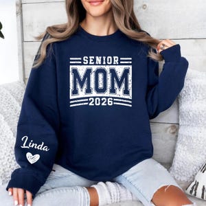 Class of 2026 Mom Shirt, Senior Mom Sweatshirt, Graduation Mom Gift, Personalized Sleeve Graduation Shirt, Varsity Senior Mom Outfit, Senior Year Parent Clothing, Game Day Mom Shirt, High School Spirit Shirt, Senior 2026 Parent Tee, Custom Name Sleeve Shirt, Graduation Celebration Outfit, Senior Night Shirt, Supportive Mom Clothing, School Event Shirt, Proud Senior Mom Tee