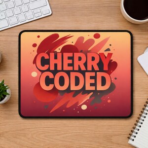 May include: A rectangular mousepad with a gradient background of orange and red. The mousepad features the words "CHERRY CODED" in large, bold, red letters. The design includes red abstract shapes and lightning bolts.