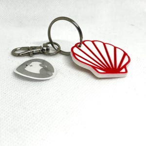 Schelpvormige NFC-badge-sleutelhanger – Deel eenvoudig uw sociale netwerken!