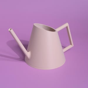 May include: A light pink watering can with a wide spout and a handle. The watering can is on a purple background.