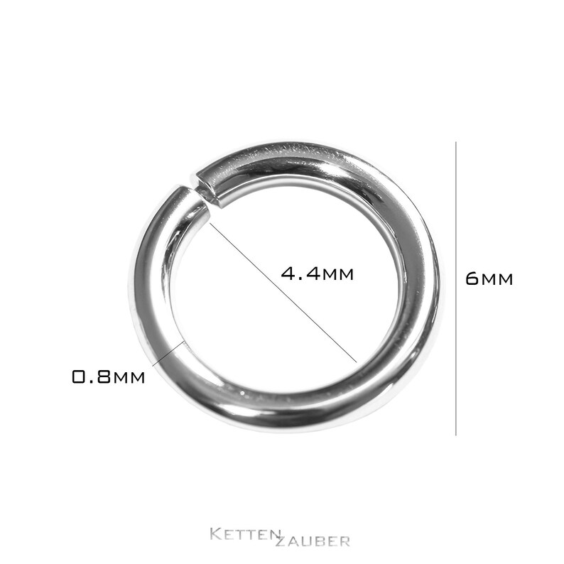 May include: A silver metal ring with a diameter of 0.6 inches and a thickness of 0.08 inches. The ring is 4.4 mm wide and 6 mm in diameter.