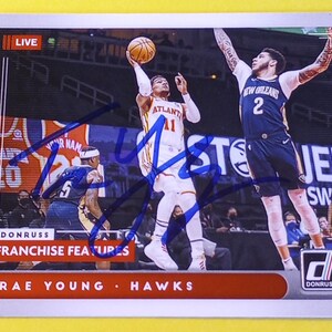 Trae Young Autographed NBA Card: 2021 Panini Donruss Franchise Feature Insert with COA