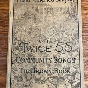 May include: A vintage book cover with a black and white illustration of a crowd of people singing in an outdoor setting. The cover text reads "I Hear America Singing" and "Twice 55 Community Songs The Brown Book" with the publisher's name "C.C. Birchard & Co. Boston".