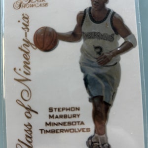 May include: A basketball trading card featuring Stephon Marbury of the Minnesota Timberwolves. The card is from the 1997 Flair Showcase Class of Ninety-Six series. The card features a photo of Marbury dribbling a basketball in his Timberwolves uniform.