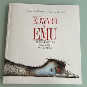 May include: A children's book titled "Edward the Emu" by Sheena Knowles, illustrated by Rod Clement. The cover features a detailed illustration of an emu's head and the title in red lettering against a white background.
