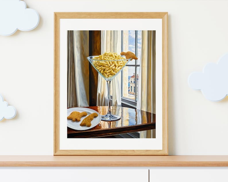 May include: A painting of a martini glass filled with yellow pasta, with a small cookie on the rim. Two more cookies are on a plate on a wooden table, with a window in the background.