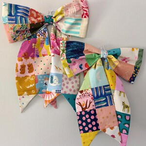 Giant patchwork bows - door or wall hanging