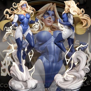 May include: A detailed figurine of a female superhero in a dynamic pose. The figure is clad in a blue and white bodysuit with a yellow cape and mask. The figure is standing on a cloud-like base with lightning bolts emanating from her hands.
