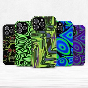 May include: A collection of five phone cases with unique designs. The cases feature vibrant patterns, including skulls, swirling lines, and geometric shapes in colors like black, green, blue, and purple. Each case has a camera cutout.