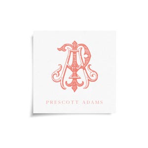 May include: A square card with a coral-colored monogram design featuring the letters "A" and "P" intertwined with decorative flourishes. The words "PRESCOTT ADAMS" are printed in a matching coral color below the monogram.