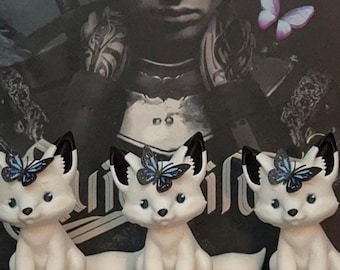 Uroczy lis z motylem inspirowany onyksem z rtęci i siarki, książka zimorodka