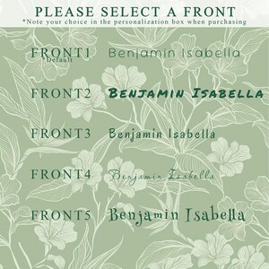 May include: Five different design options for a personalized gift. The options are labeled "FRONT1", "FRONT2", "FRONT3", "FRONT4", and "FRONT5". Each option features the names "Benjamin" and "Isabella" in a decorative font.