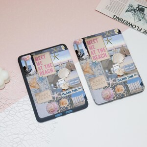 May include: Two black e-reader cases with a collage of summer-themed images. The images include seashells, starfish, a beach house, and the text "Meet me at the beach." and "East Coast".