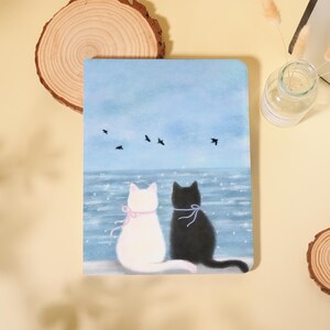 Creative Couple Cat Black-White Pattern Sea Background iPad Case With Pencil Holder Cover for 2026 Air 7