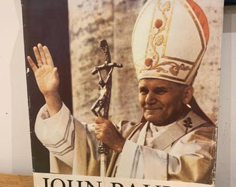 Libro de tapa dura ilustrado de Juan Pablo II, el Papa de Polonia, de 1979.