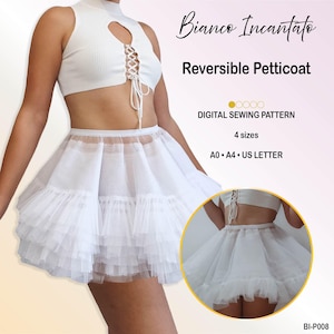 May include: A white reversible petticoat digital sewing pattern titled Bianco Incantato. The image displays a tiered, ruffled white skirt and a matching white lace-up crop top. Text includes Digital Sewing Pattern, 4 sizes, A0, A4, US Letter, and BI-P008.