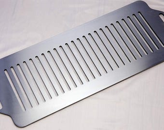 IJzeren plaat met een hoog warmtebehoud, essentieel voor het heerlijk grillen van vlees
