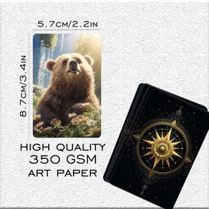 May include: A brown bear cub sitting in a forest setting with green foliage and white flowers. The image is a close-up of the bear's face. The text "HIGH QUALITY 350 GSM ART PAPER" is printed below the image.