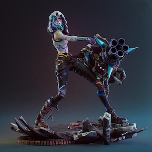 May include: A detailed figurine of a character with teal and purple hair wearing a white hooded top, black pants, and boots. The character holds a large, multi-barreled purple and blue weapon while standing on a base of broken concrete debris.