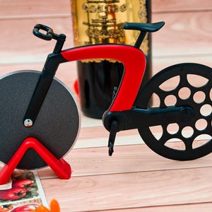 Cortador de pizza con forma de bicicleta creativa Red