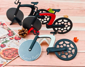 Tagliapizza a forma di bicicletta creativa