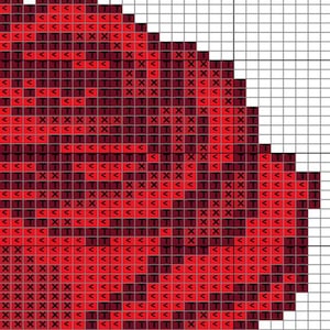 Puede incluir: Un patrón de punto de cruz que presenta una forma de corazón, renderizado en tonos de rojo y burdeos. El diseño se compone de pequeñas puntadas cuadradas, creando un efecto pixelado. El corazón está sobre un fondo de cuadrícula blanca.