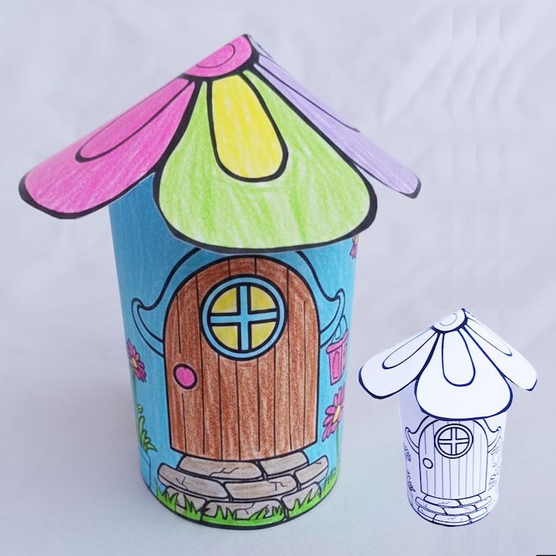 May include: A whimsical, hand-drawn fairy house with a flower-shaped roof in pink, green, and yellow. The cylindrical body is blue with a brown door and stone base. A smaller, uncolored version sits beside it.