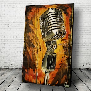 May include: A vintage-style microphone with a silver finish and a black stand. The microphone is set against a background of orange, yellow, and brown paint splatters.