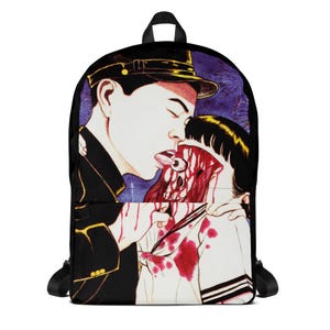 May include: Black backpack featuring a graphic illustration of a man and woman in a disturbing scene. The artwork depicts a man with his tongue out and a woman with blood on her face. The background is dark with purple hues.