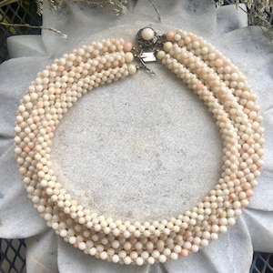Most amazing natural coral hand beaded vintage antique bib necklace.