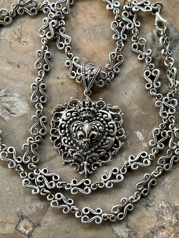 Fleur-De-Lis Cross Pendant with Fancy Bead Design Antiqued Sterling Silver Fleur-De-Lis Cross Pendant with Fancy Bead Design Antiqued Sterling Silver
