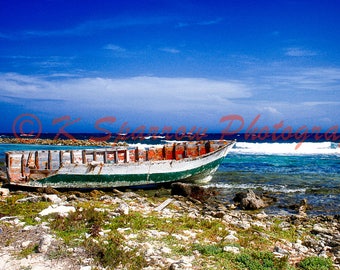 Old boat, Baby Beach, Aruba - photograph, ocean, clouds, Caribbean, sky, island, blue, boat, beach, sand, waves, coral, reef, washed up