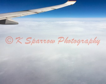 Above the Clouds - Photograph of earth from 30,000 feet