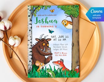 May include: A colorful birthday invitation featuring illustrations of woodland creatures. The invitation reads "Joshua is turning 3" and includes event details. The design includes an owl, fox, mouse, and frog. The invitation is on a gold tray.