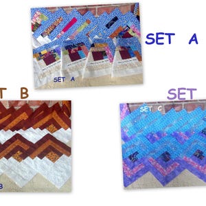 May include: Three sets of fabric quilt blocks labeled SET A, SET B, and SET C. SET A features blue patterned squares with white borders. SET B displays brown, orange, and white chevron-style blocks. SET C shows blue and purple patterned blocks.