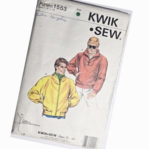May include: A vintage Kwik Sew pattern packet, featuring illustrations of two men in jackets. The packet has the text "Pattern 1553" and "KWIK SEW" printed on it. The sizes are S, M, L, and XL. The packet is white with a green price sticker.