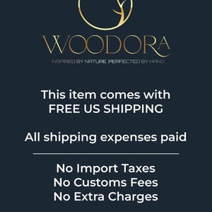May include: A dark navy blue graphic with a gold circular logo containing a stylized tree branch silhouette. Below the logo, the text reads WOODORA, followed by the tagline INSPIRED BY NATURE. PERFECTED BY HAND in gold capital letters.