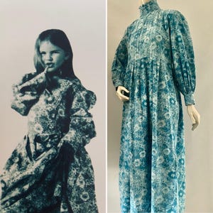 May include: A teal and white floral patterned dress with a high neckline and long sleeves is displayed. The dress is shown on a mannequin. The image also includes a black and white photo of a young girl wearing a similar dress.