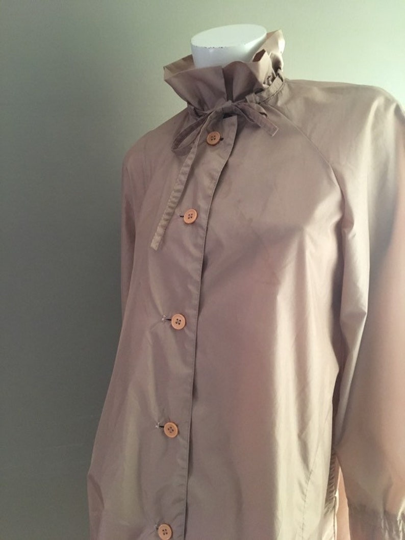 Vintage 1980s mid length Nylon A-Line rain coat with ruffle | Etsy