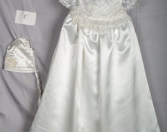 christening gown made out of satin, lace with matching hat